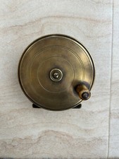 Vintage brass fishing reel