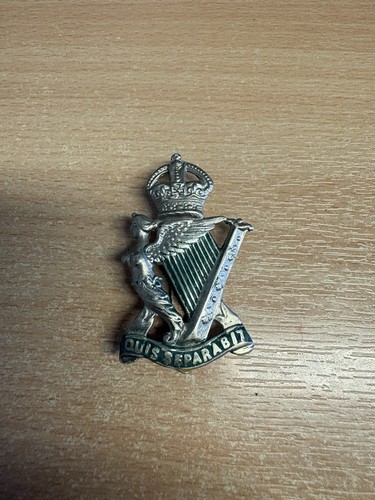 Cap badge for the - badge, royal