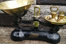 Vintage set of Boots brass scales with seven brass weights