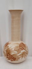 Jersey Pottery Bud Vase.Cream,brown floral.Signed C.L. Height 4.25".