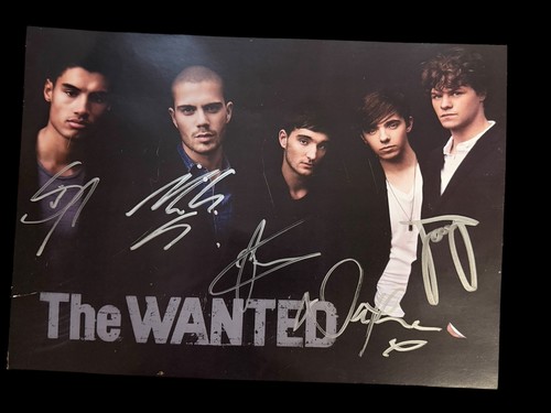 The wanted hand signed - the, photo