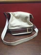 Caterina Tan And Brown leather