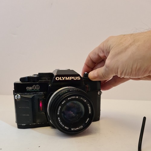 Olympus om40 program 35mm film - olympus,