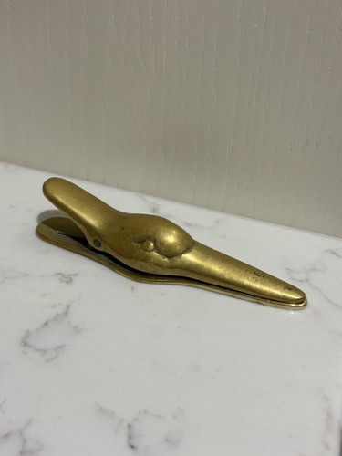Vintage brass duck - duck, paper
