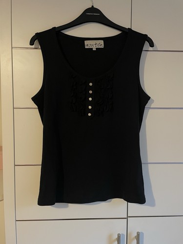 Black vest with ruffles and - black,