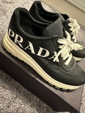 Prada Trainers Ladies Size 38. Black. 