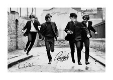 The Beatles 1 A4 signed