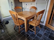 4 x oak chairs. solid and sturdy.  chairs only  (Table is on a separate listing)