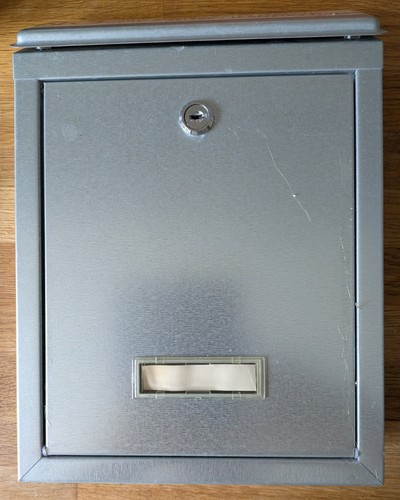 Grey wall mounted mail post - mail,