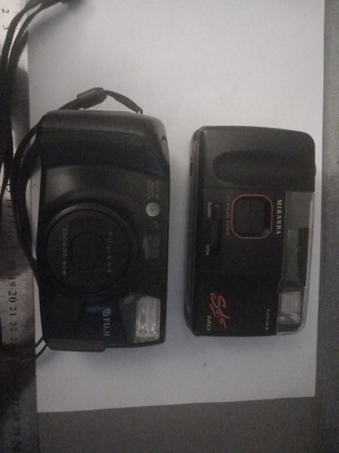 Two 35mm cameras - cameras, last