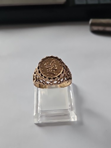 Gold coin ring - ct,