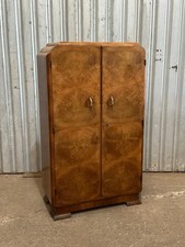 A 1930’s Art Deco walnut wardrobe