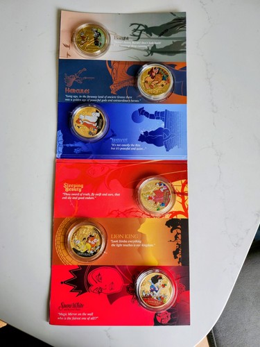 Disney gold plated coins - gold,