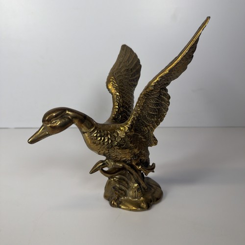 Vintage solid brass flying - solid,