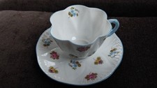 SHELLEY DAINTY CUP AND SAUCER WITH ROSES,PANSIES AND FORGET -  ME - NOTS