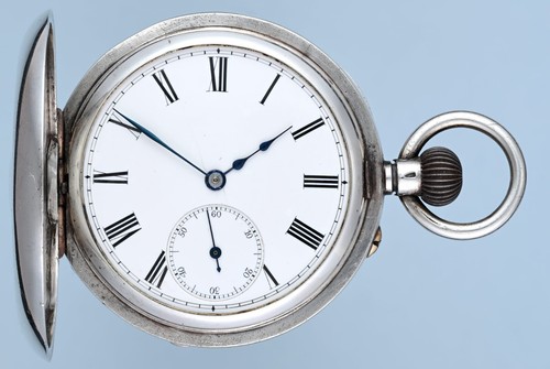 Silver half hunter examined - half,