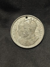 A vintage coronation medal