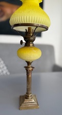 antique small yellow oil lamp