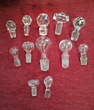 12 Vintage Glass Decanter Stoppers,  cut glass ,and blown glass all sizes.
