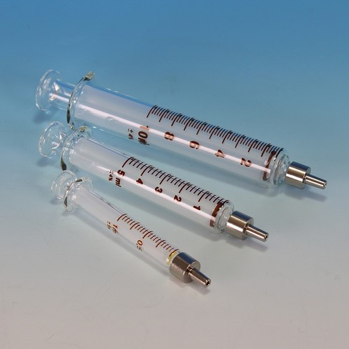 Glass syringe with - metal, tip