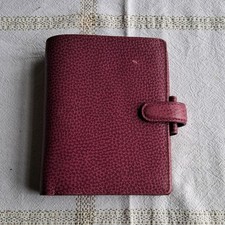 Filofax Finsbury Pocket Raspberry.  Real Leather with some Inserts. Used.