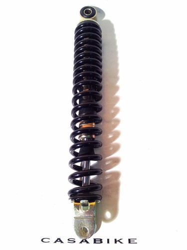 Strut shock absorber - , rear