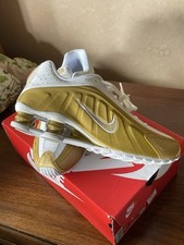 Nike Shox Metallic Gold And