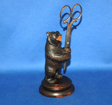 An antique carved wooden upright standing bear figure, scissor holder, 19th cent