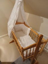 Used baby swinging crib