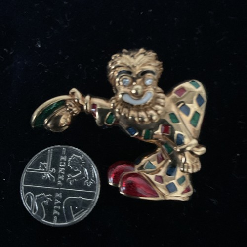 Gold tone jolly - tone, brooch