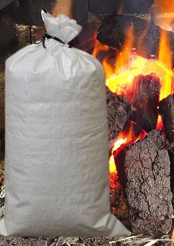 Peat briquette fire - peat, burning