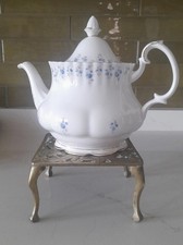 French square brass trivet
