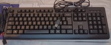 Keyboard and mouse for computer with English  letters normal size .             