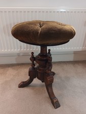 Antique 3 Leggied Revolving