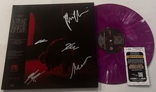 KNOCKED LOOSE SIGNED A TEAR IN