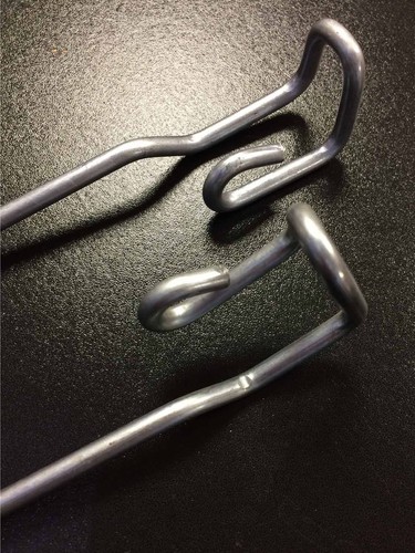 Side panel spring for