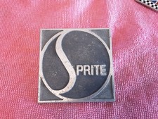 sprite caravan badge