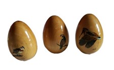 Three Glazed Wooden Eggs Hand