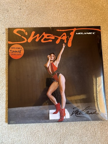 Melanie sweat signed orange - c,