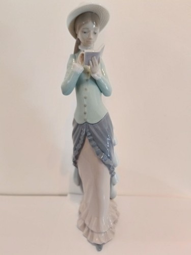 Lladro lady reading book - "lady,