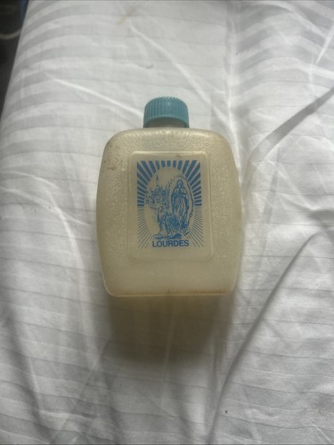 Old plastic holy water bottle