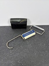 Vintage Luggage Weighing