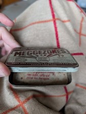Vintage Meggezones Tin for