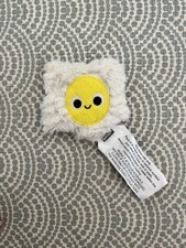 Small microwavable hand warmer in a fluffy egg design From urban outfitters New