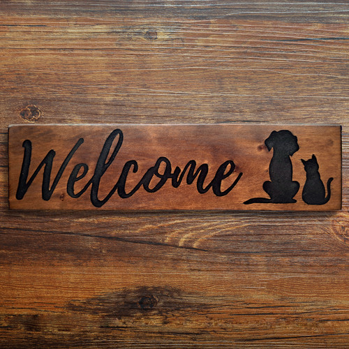 Hand carved welcome pet - “welcome”,