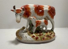 Rare vintage staffordshire cow & calf piece 