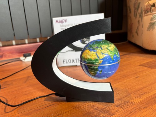 Floating magnetic globe with - floating,