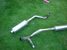 MOTORCYCLE CUSTOM HIGH LEVEL EXHAUST PIPES WITH SILENCER CANS.