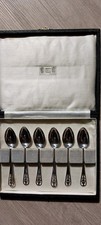 A CASED SET OF SIX HALLMARKED SILVER COFFEE SPOONS BY JAMES DIXON & SONS -SHEFFI