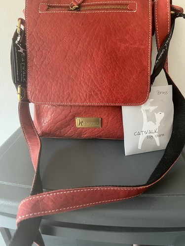 Red catwalk hand bag - hand, brand